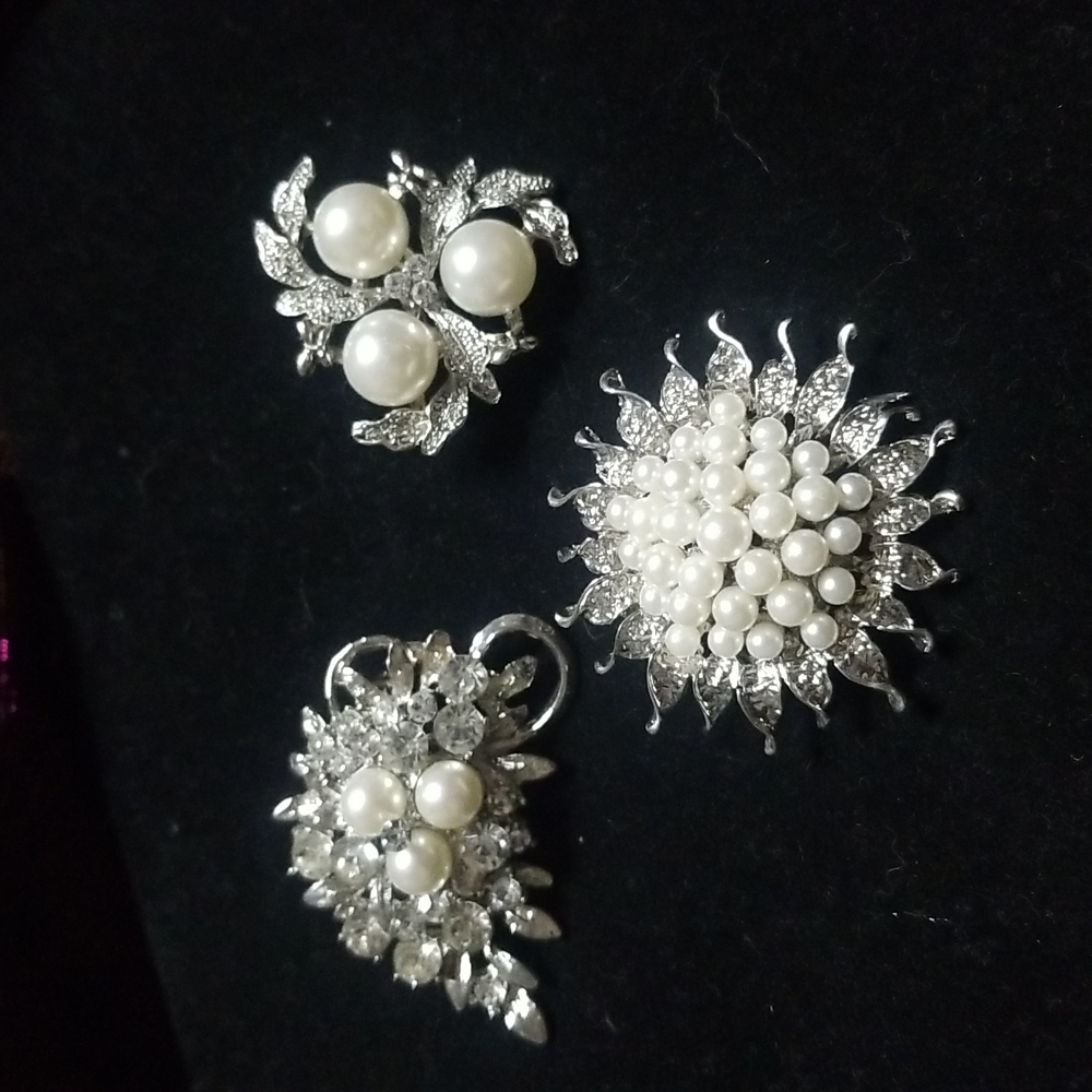 Noce grouping of 3 rhinestone and pearl brooches